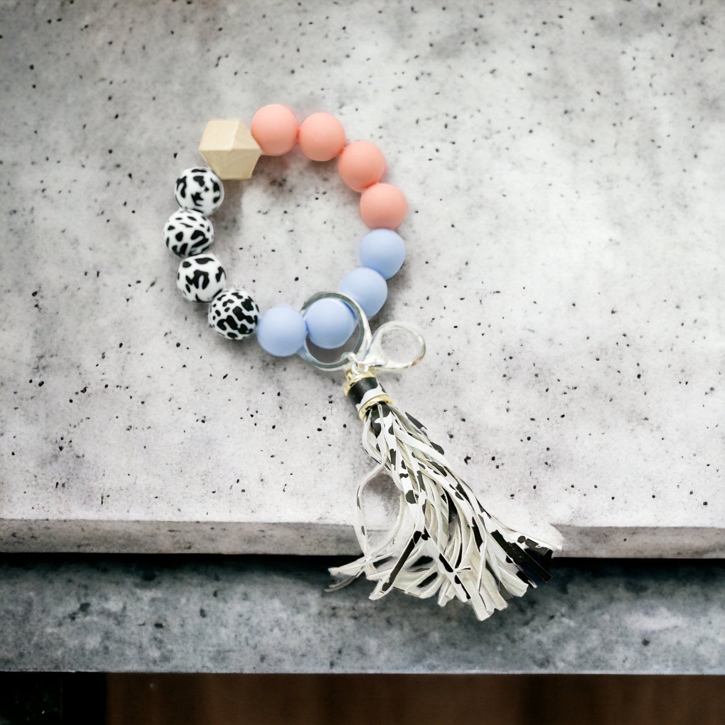 Peach and blue cow tassel keychain wristlet