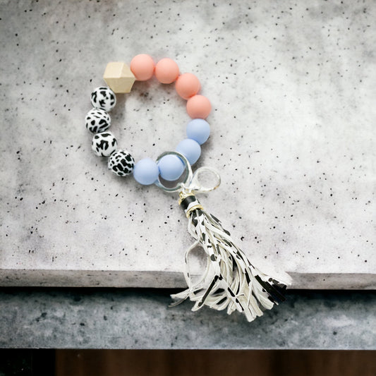 Peach and blue cow tassel keychain wristlet